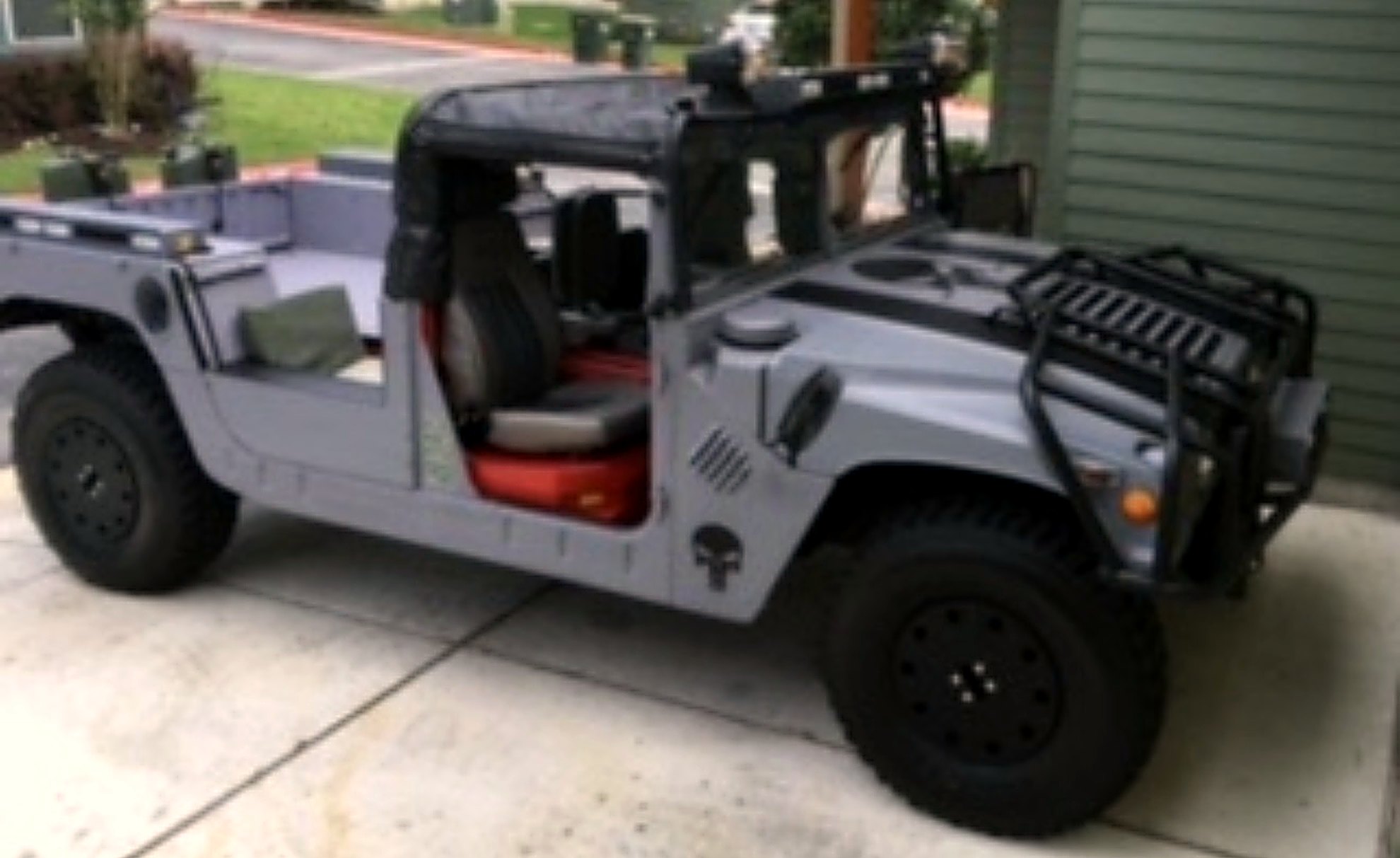 Open-top HMMWV build in grey with hood cargo rack