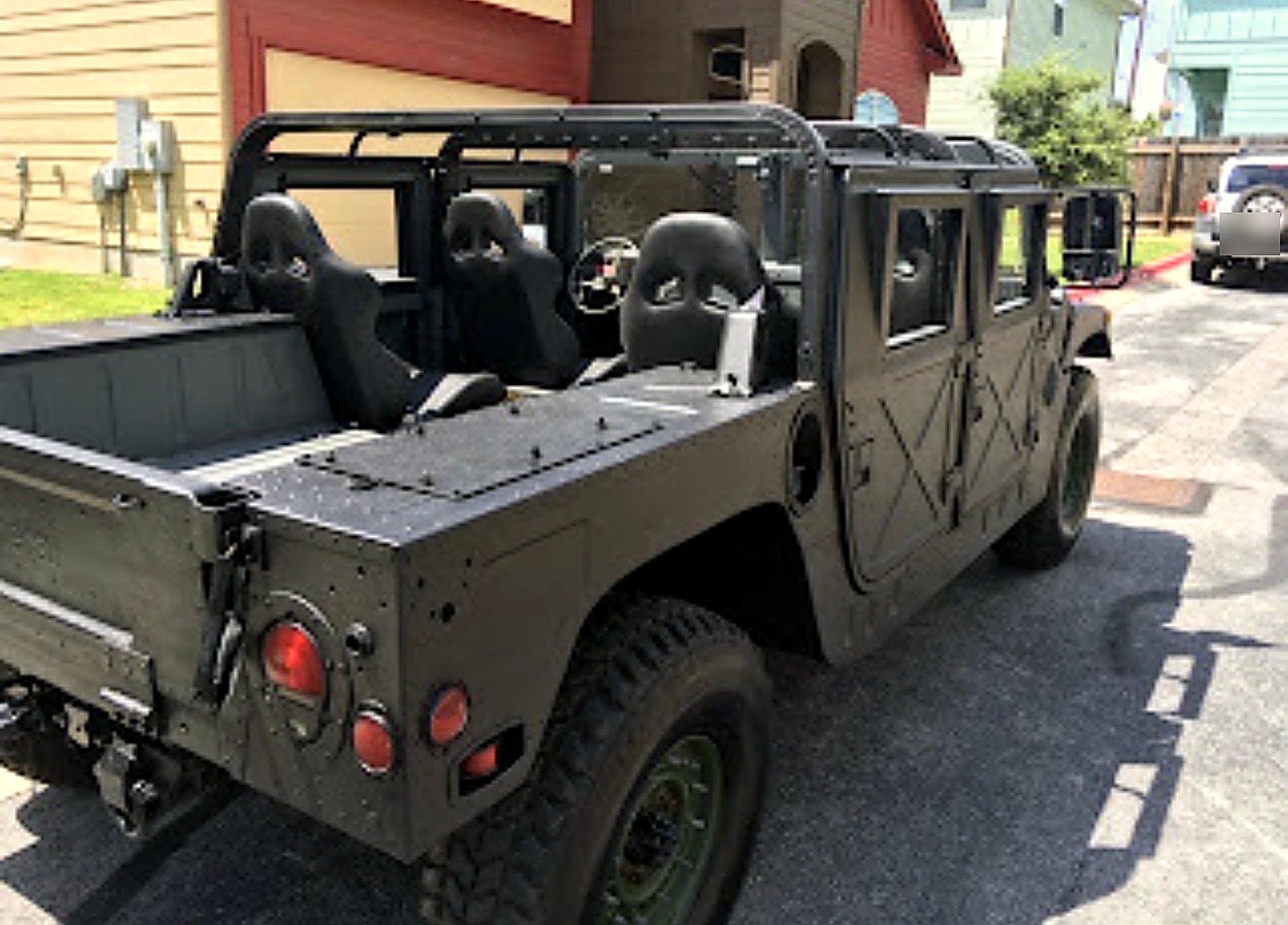 LuxeHaus open-bed HMMWV build — rear three-quarter view