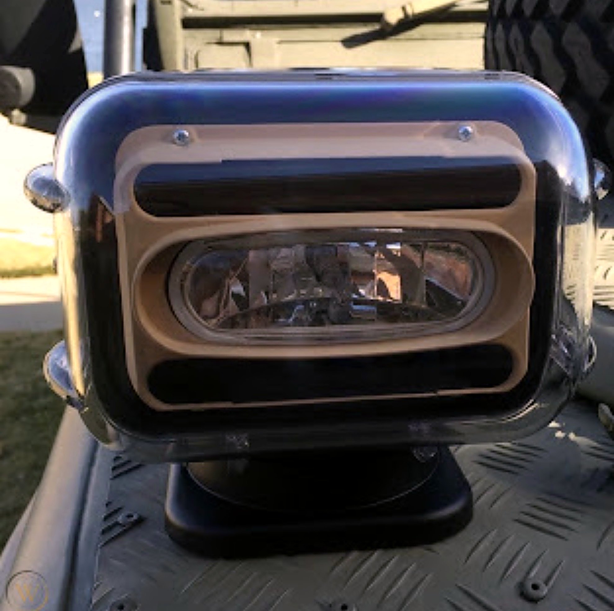 Remote searchlight mounted on diamond plate